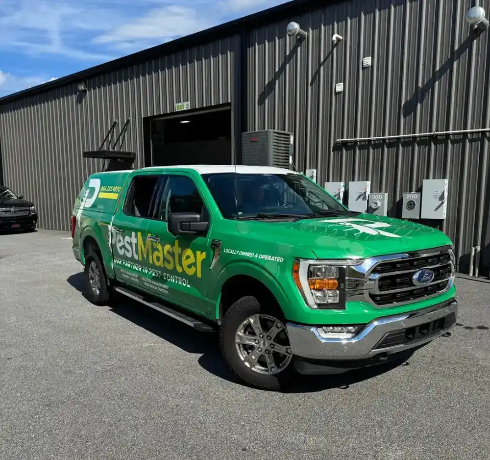 Custom PestMaster full vehicle wrap on a Ford F-150 by Katazoom.